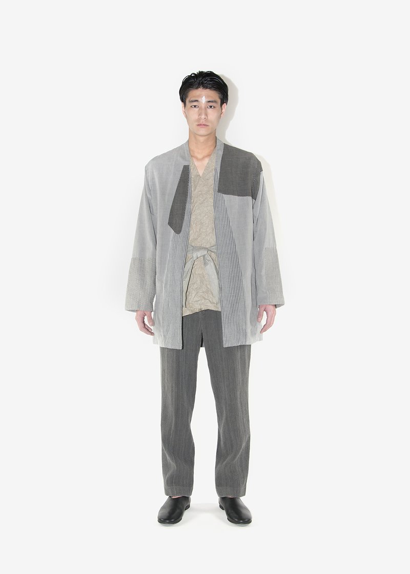 15. Bingo-kasuri jacket and slacks - sumikuroBingo-kasuri cotton produced by a traditional textile manufacturer in Japan. Woven slowly with an antique shuttle weaving machine. This method of weaving allows air to get inside the cotton during the weaving process.