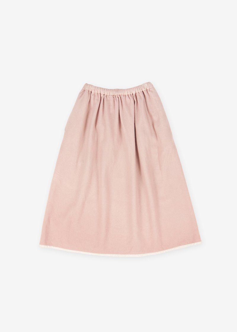 74. Herbal dyed pure woolen skirtLayered linen lining retains warmth. 100% pure sheep's wool light melton. The color comes from a lac herbal dye.