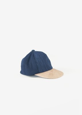42. Washi and Bingo-kasuri cap - indigoComposed of handmade washi paper and Bingo-kasuri fabric. The color of washi comes from a persimmon tannin dye.