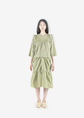 25. Organic cotton french twill frilled shirt and organic cotton broad cloth wrapped skirt - pomegranate herbal dyeComes in white, natural, black, beige, lac herbal dyed pink, pomegranate herbal dyed green and Ryukyu indigo.