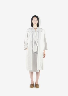 83. Canvas kimono coat, canvas top with Hakkaku-Shinka embroidery and canvas wrapped skirt - old whiteMade with organic cotton linen canvas. Comes in beige, old white, red-printing and black printing. Worn with naturally tanned leather shoes.