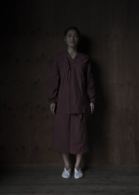 38. Organic farming hand-spun cotton dress and wrapped skirt | redThe cotton used for the collection are cultivated with organic farming methods. It was hand-spun, and producing a soft and plush fabric. Woven slowly with a shuttle weaving machine. This method of weaving allows air to get inside the cotton during the weaving process. Comes in natural, black, lac herbal dyed red and Ryukyu indigo.