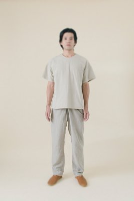 43. Sashiko shirt, Linen wrapped pantsFabric woven with sashiko techniques using shuttle weaving machine. Fabric is composed of organic cotton for the warp, and alternate layers of hemp threads and organic cotton for the woof. Sashiko stitches are cross woven with twisted hemp threads. Wrapped pants made from fine belgian linen fabric.