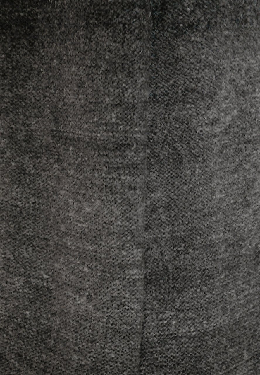 Made by nature and human hands. Hand-spun yarn and hand-knitted.