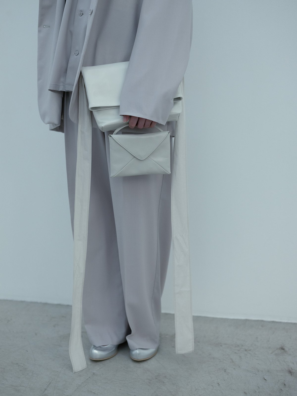 Light leather clamshell bag and Envelope purse