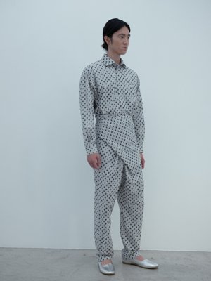 Old owlish floral-patterned shirt and wrapped pants