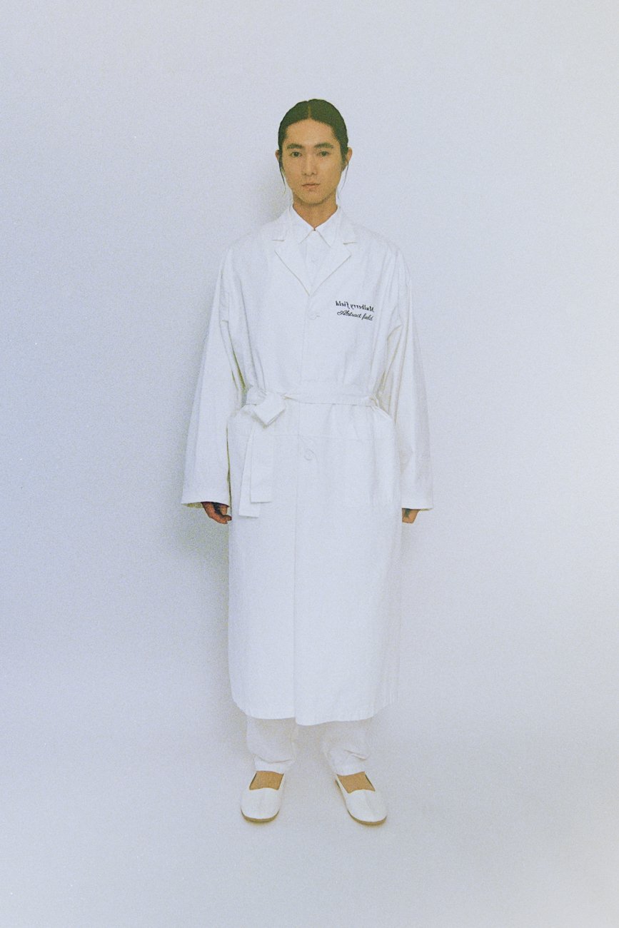 School jacket with embroidered "Mulberry field". Cotton canvas with a nep texture that gives the impression of old cloth.