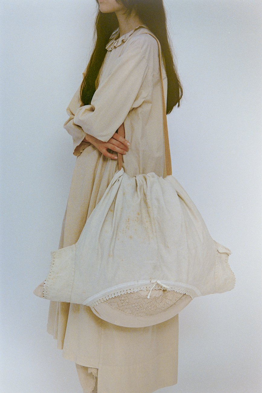 Abstract painter’s bag. Made of antique pillowcase and night clothes.