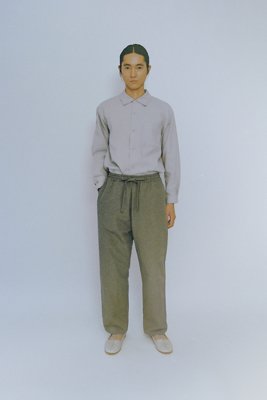 Folk dress pants with pleated tucks in the front.