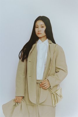 Unique reversible jacket with tailored collar folded inside.