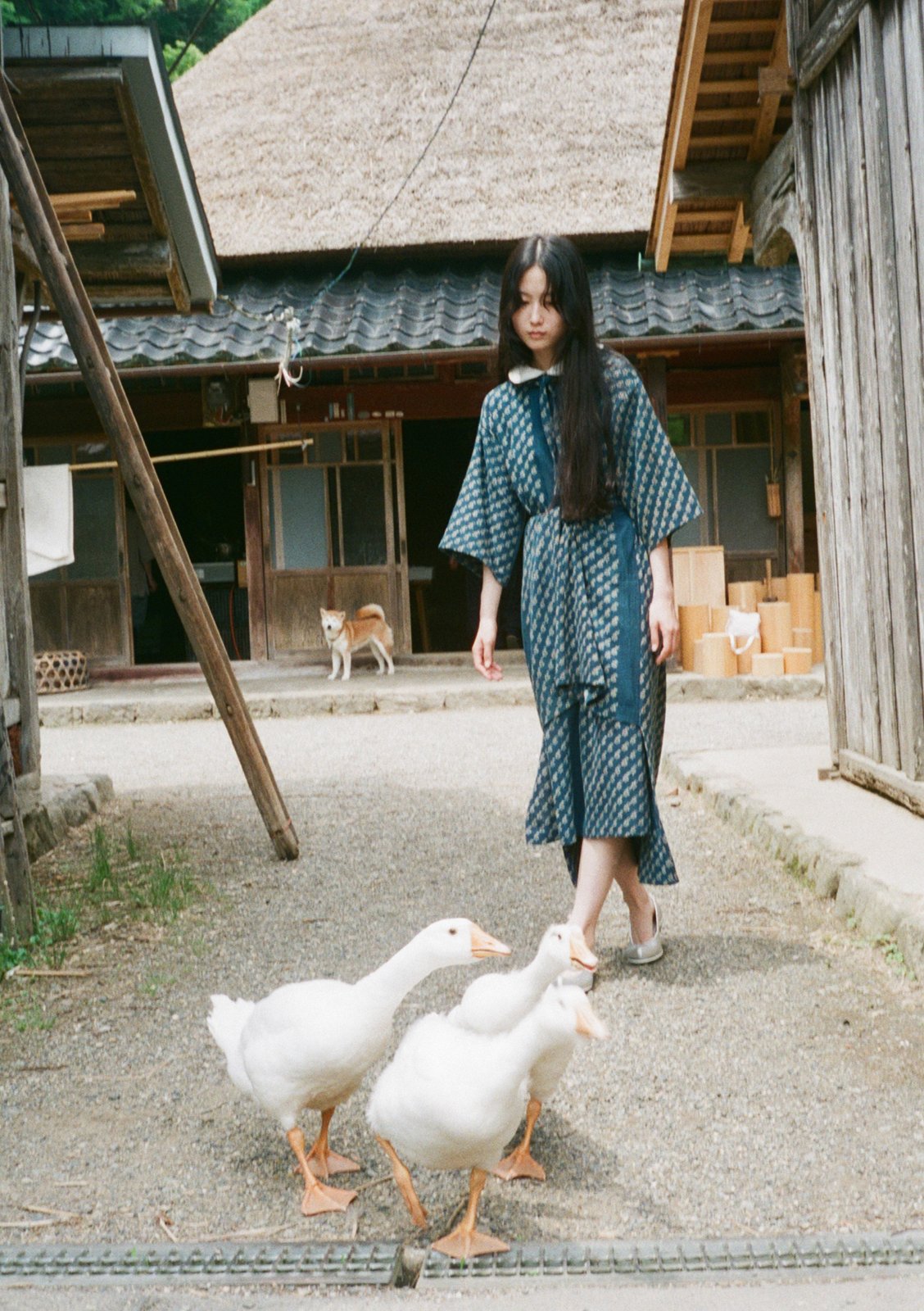 White round-collar bow-tie wrapped dress by Butti Ajrakh, Hand-woven organic kara cotton fabric layered with indigo and natural dyeing